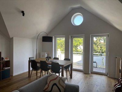 Attraktive Dachgeschoßwohnung mit zwei Balkonen & gemütlichem Schwedenofen