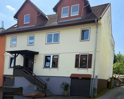 Charmante Hochparterre-Wohnung mit Wintergarten und Einbauküche