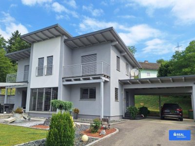 Modernes Einfamilienhaus mit Pool und Gartenidylle bei Griffen