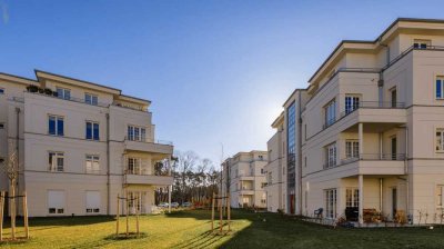 Ruhige 3-Zimmer-Terrassen-Wohnung mit EBK, Fußbodenheizung, Gäste-WC & 2 PKW-Stellplätzen