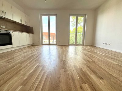 Erstbezug: Geräumige 4-Zimmer-Wohnung mit Balkon, hochwertiger EBK und 2 Bädern