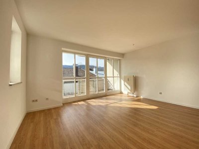 Sonnige Maisonette-Wohnung mit Bergblick - zwei Etagen, zwei Balkone, tolle Lage!