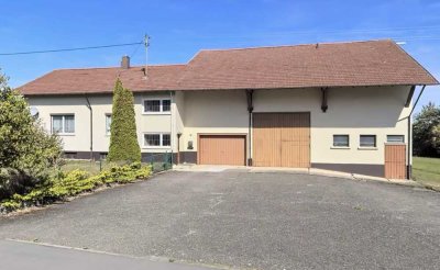 Ehemaliges Bauernhaus mit Garten, großer Scheune und Garage zu vermieten