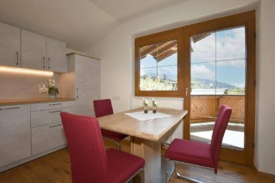 Dachgeschosswohnung in einem Zweifamilienwohnhaus in St. Johann in Tirol