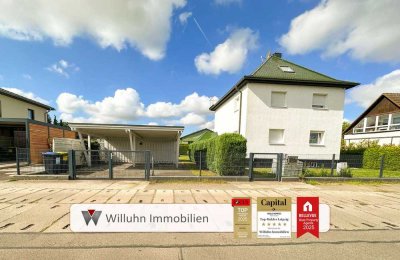 Freistehendes Einfamilienhaus mit schönem Grundstück l Dachterrasse & Garten | Doppelcarport