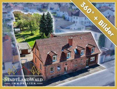 Drei Wohneinheiten, Bauplatz & Gartenidylle – Investieren und Wohnen in Münchweiler