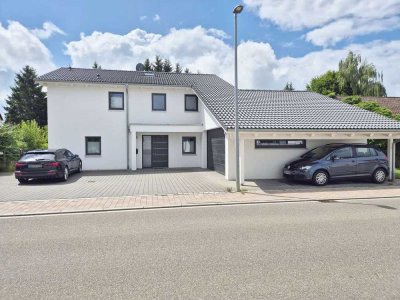 Architektur trifft Wohnkomfort – Einfamilienhaus mit Doppelgarage & Gartenparadies