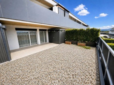 Neuwertige 2-Zimmer-Eigentumswohnung mit großer Sonnenterrasse und Carportstellplatz
