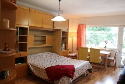 Ruhiges 1-Zi-App mit Terrasse und Gartenblick Nähe Stadtgarten, Philharmonie und Bismarckplatz