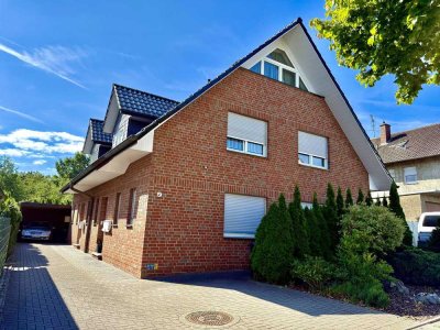 Zwei Wohnungen, eine Immobilie: Vermietete Doppelhaushälfte in Löhne!