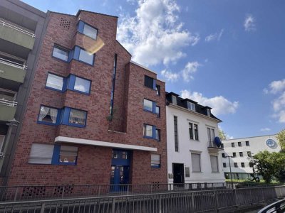 Zentral gelegene 3,5-Zimmer-Wohnung mit Balkon und grünem Ausblick
