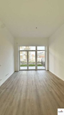 Große 3-Zimmer-Wohnung mit Terrasse und Garten – EBK kann auf Wunsch des Mieters eingebaut werden.