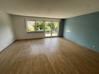 Maisonette Wohnung Nähe Schlosspark mit offenem Wohn-Essbereich und Tiefgaragenstellplatz