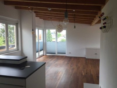 Moderne 2‑Zimmer Penthouse-Wohnung mit Dachterrasse in zentraler Lage in Oberursel (Taunus)