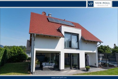 Modernes, energieeffizientes Einfamilienhaus mit Garten in ruhigem, familienfreundlichem Wohngebiet