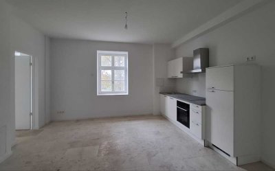 Modernes Appartement, Erstbezug , EBK, Fussbodenheiz. PV Anlage