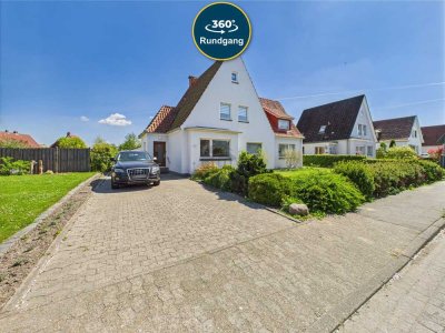 FAMILIENGLÜCK MIT GARAGE, GARTEN, ÜBERDACHTER TERRASSE UND VIEL PLATZ FÜR ZWEI GENERATIONEN