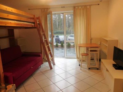 Möblierte 1-Raum-EG-Wohnung mit Tiefgaragenplatz