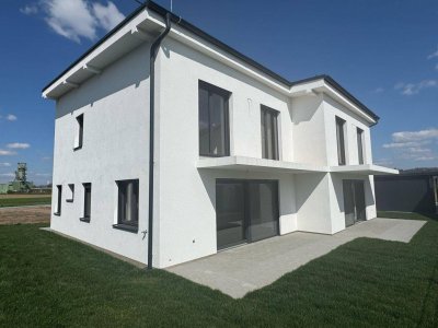 Sonnige Doppelhaushälfte mit Doppelcarport, Kellerersatzraum und großer Südterrasse!