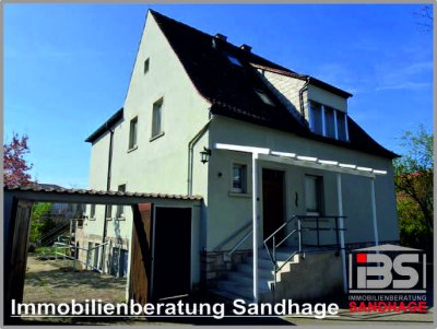 Attraktives Zweifamilienhaus mit parkähnlichem Garten