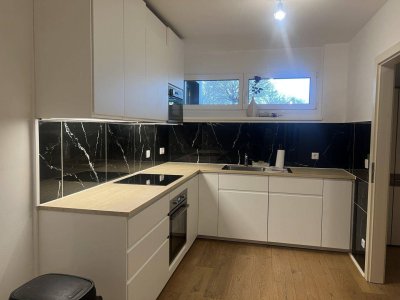 Neuwertige Gartenwohnung, barrierefrei, zentrumsnah, Garage