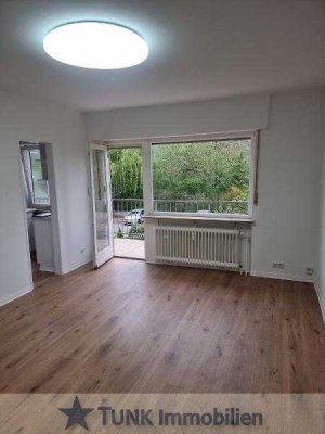 Neu renovierte 1 Zi.- Whg mit Blick ins Grüne vom Balkon, mit EBK und Stellplatz in Dietzenbach!