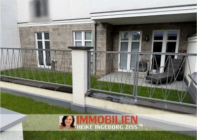 Moderne Erdgeschosswohnung mit Terrasse und kleinem Gartenanteil