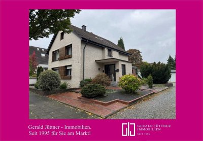 Bottrop-Boy: Charmantes Zweifamilienhaus mit großem Grundstück und Garagenhof