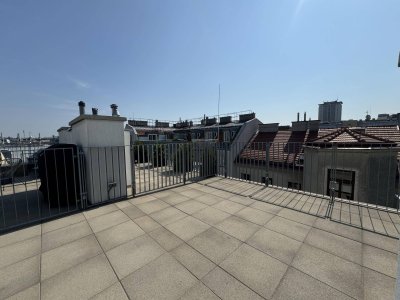 Erstbezugs-DG-Wohnung mit Terrasse und Weitblick!