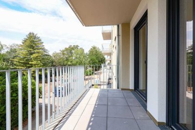 Edle Erdgeschosswohnung mit Balkon, lichtdurchfluteten Räumen und moderner Einbauküche