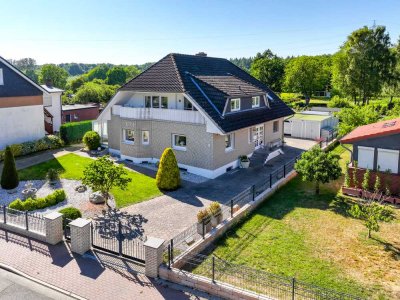 Einfamilienhaus mit Einliegerwohnung und traumhaften parkähnlichen Grundstück in Haffkrug