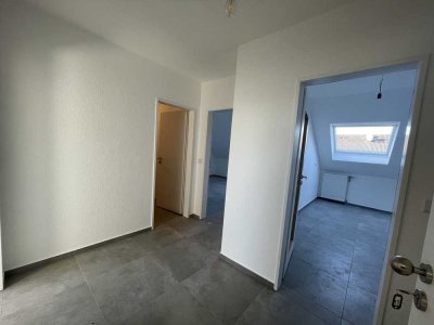 Erstbezug nach Sanierung: Attraktive 2-Raum-Dachgeschosswohnung in Herzebrock