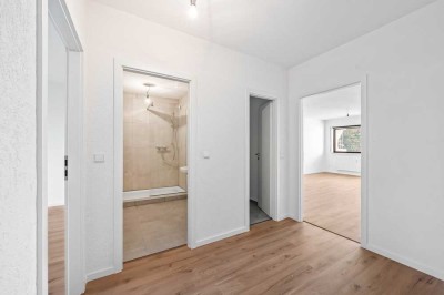 Modernes Wohnen: Sanierte 2,5‑Zimmer‑Wohnung mit großzügigen Räumen, Balkon und Garage