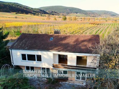 Wohnen in Traumlage – großes Grundstück inmitten der Weinberge mit Sanierungs & Aufstockpotenzial