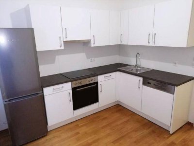 Neuwertiger 2 ZIMMER-NEUBAU + Balkon 4,5m² + extra Küche möbliert + Bad mit Dusche + extra WC + Lift