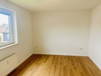 Schwerte-Holzen: Schöne 2-Zimmer-Wohnung mit Einbauküche, Balkon, & Garage