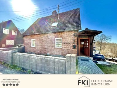 **Vielseitiges Einfamilienhaus in familienfreundlicher Ortslage von Burbach**
