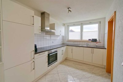 Ruhige 2,5-Zimmer-Wohnung mit Balkon, Gartennutzung und Doppelgarage - Hochwertig ausgestattet!
