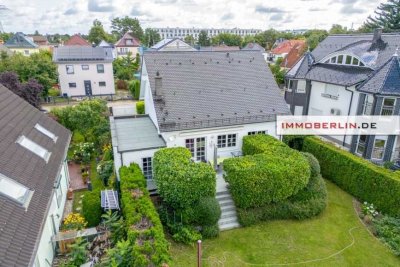 IMMOBERLIN.DE - Sehr attraktives Haus mit herrlichem Südwestgarten & Garage in familienfreundlicher
