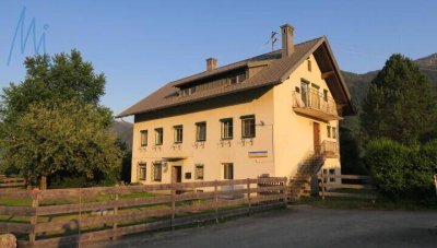 Dachgeschosswohnung mit Garten in geräumigen Zweifamilienhaus Nähe Nassfeld in Watschig
