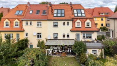 Reihenmittelhaus mit klarer Raumstruktur und Gartenidylle