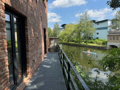 Terrassenwohnung mit Garten und direkter Wasserlage