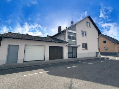 Willkommen daheim! Tolles 2-FH mit 2 sep. Eingängen, 2 Garagen, Balkon, Terrasse und schönem Garten