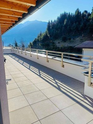 Exklusive 3- Zimmer- Dachwohnung mit 50 m² Traum- Dachterrasse