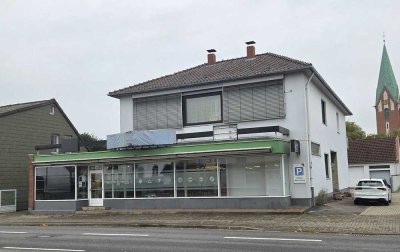Attraktive Wohn- und Gewerbeimmobilie mit großem Garagenhof in zentraler Lage