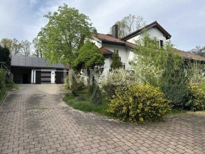 Großzügiges Zweifamilienhaus mit Weitblick: Ihr Zuhause im Grünen