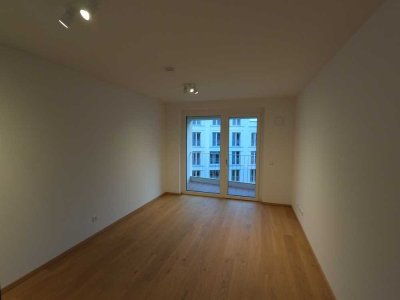 Neuwertiges, helles 1-Zimmer-Studio mit Einbauküche und TG-Stellplatz an der Isar