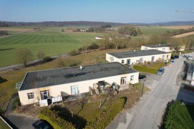 Attraktive Kapitalanlage: Drei modernisierte Mehrfamilienhäuser mit ca. 985 m² Wohnfläche