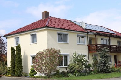 Hochwertiges Zweifamilienhaus mit Indoor-Pool, Tiefgarage und großzügigem Grundstück