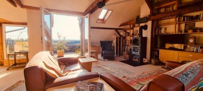 Einzigartige Maisonette Wohnung im Nordend mit Sauna und Skyline Blick.